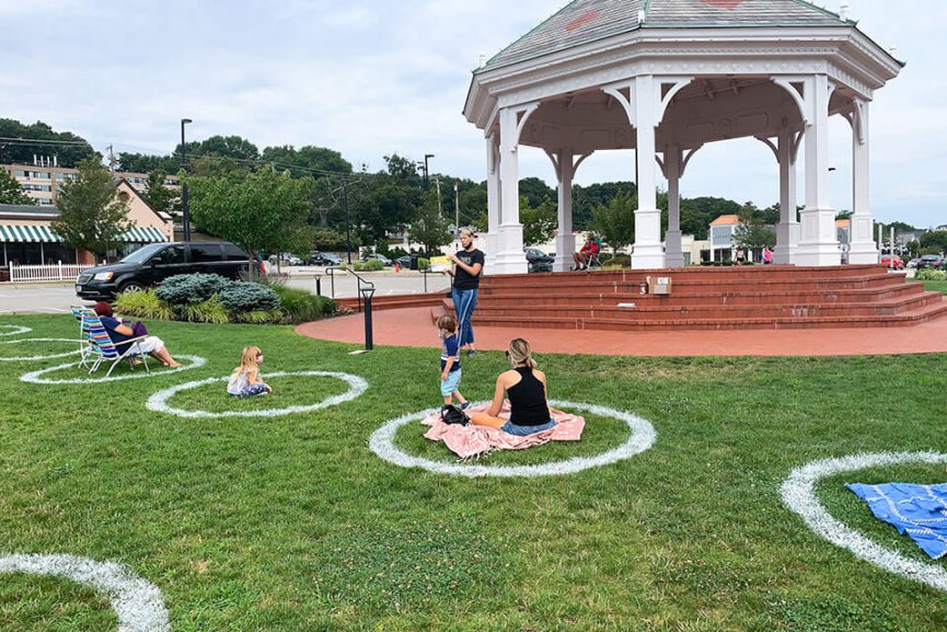 Socially distanced circles spray painted on the lawn at Garden City Center